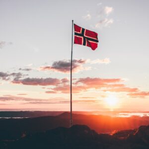Norway flag standing on cliff